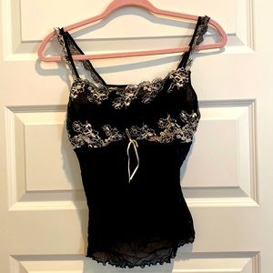 2 piece tank and boy shorts. Never worn.